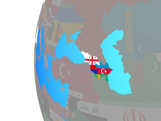 Caucasus region with embedded national flags on blue political globe.