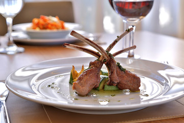 Rack of Lamb on a white plate