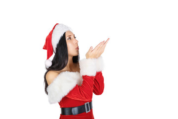 Beautiful girl Santa Claus with Asian looks with dark hair in Santa costume on white background. Insulations.