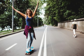 Fototapeta premium girl posing with skate board