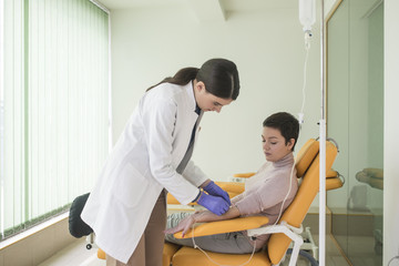 Doctor Giving Therapy to Patient