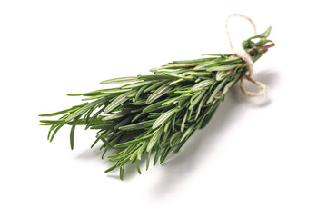 Tied fresh rosemary on a white background