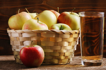 basket full of apple and autumn leaves