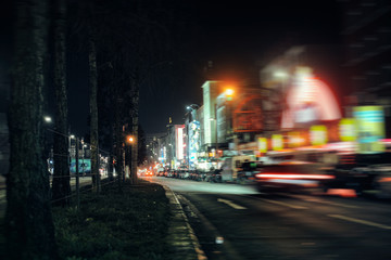 Fototapeta na wymiar HAMBURG GERMANY Reeperbahn. Streets and buildings at night time exposure Europe