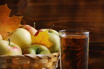 autumn composition with apple in basket