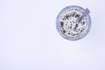 Chia seeds are drunk with airan from a glass.