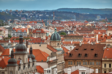 Houses with traditional red roofs in Prague Old Town Square in the Czech Republic