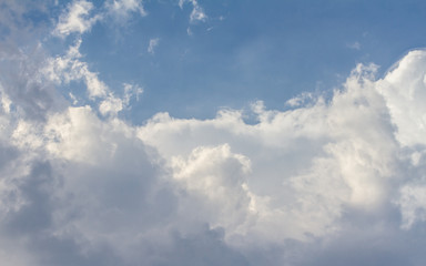 Fototapeta na wymiar Clouds moving in blue sky