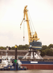 Fototapeta premium large grain terminal in the river port. Capacity and storage of grain.
