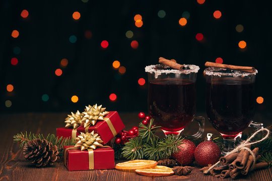 Glasses of mulled wine on wooden table
