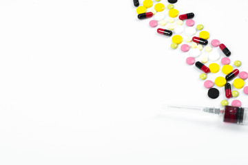 Many colorful pills and tablets isolated on white. vitamin pills. Collection of medicine pills on table.Lots of different medicine drugs, pills, tablets, capsules