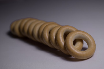 small yellow drying laid out in a row at each other on a white background
