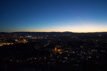 Fototapeta na wymiar Panorama of Granada, Alhambra and Sierra Nevada with Afterglow seen from Sacromonte Hill, Spain