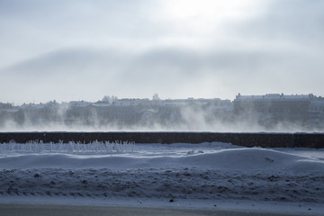 Winter cityscape, coast of Neva river