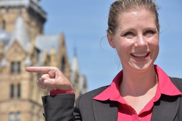 Adult Blonde Business Woman Pointing Wearing Suit