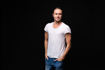 Fototapeta premium handsome young and fit man posing in casual clothes