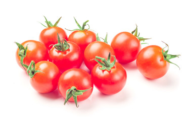 Cherry tomatoes isolated over white background