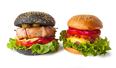 black cheeseburger with patty wrapped in bacon and BLT cheeseburger with onions, isolated on white background