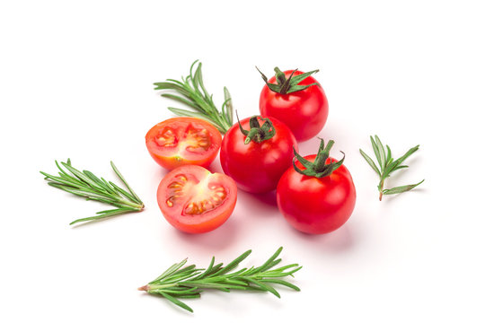 Cherry tomatoes with rosemary from above on white