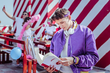 Check information. Silhouette of happy people that using their gadgets for taking pictures