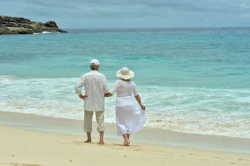 Portrait of elderly couple at tropical beach