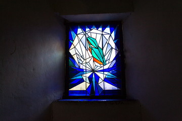 Beautiful kingfisher on stained glass on Old Town Bridge Tower, Charles Bridge, Prague, Czech...