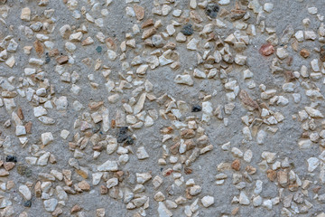 Scattered rough chips of stone background texture