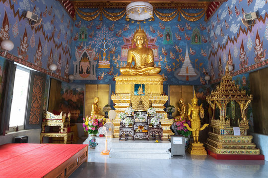 Sitting Buddha in Wat Kaew Korawaram Temple in the Center of Krabi Town, Province of Krabi, Thailand