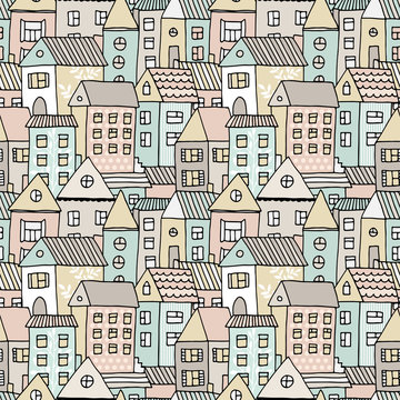 Hand drawn seamless pattern with doodle houses, vector background with cartoon town © Fandorina Liza