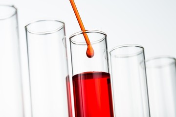 Closeup of Test Tubes and Pipette