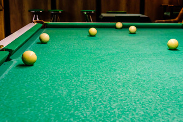 Balls on the green cloth. Russian billiard