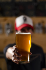  hand with glass of beer