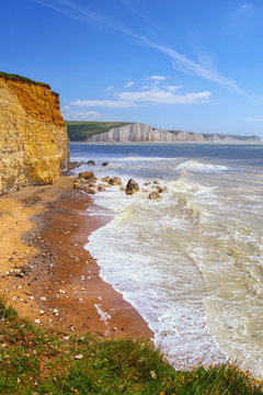 Looking down on hope cove from the cliff top with birling gap and the seven sisters in the background