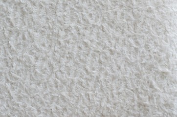 The photo of white color sofa cover taking as background.