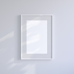 White blank frame on the light gray wall. Frame mock up. - 226806881