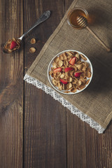 Breakfast of oatmeal with strawberries.