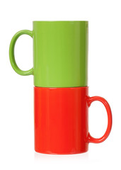 Two empty cups for coffee or tea, isolated on white background