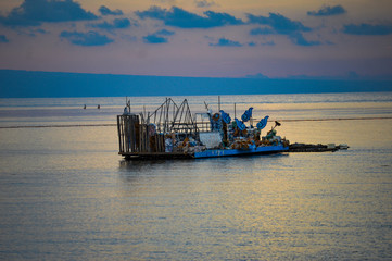 fishing boat at sunset - 226809637
