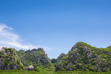 Fototapeta na wymiar Mountainous views with bright blue skies as background scenes. At Khao Sam Roi Yot in Kui Buri District, Prachuap Khiri Khan Province, Thailand.