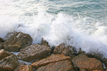 waves crashing on rocks