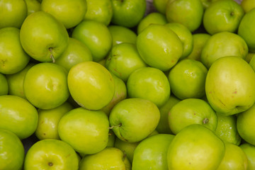 Fresh juicy Jujube or green monkey apple in the market.