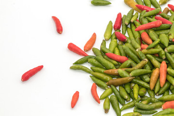 Red and green chilli pepper isolated on white background. common names : Small Chilli Padi, Bird's Eye Chilli in Capsicum annuum Solanaceae family.