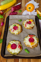 zucchini pizza with pepperoni, tomatoes, cheese and basil