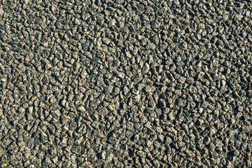 Many small stones in a row. Background stones