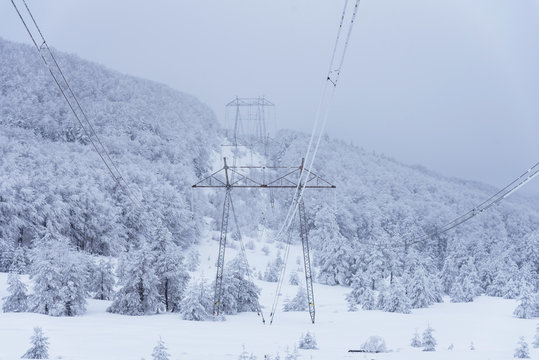 High voltage power lines in the winter.