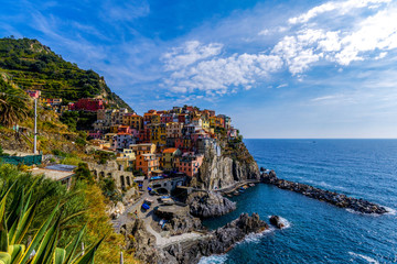 Fototapeta na wymiar Colorful cityscape on the mountains over Mediterranean sea, Cinque Terre, Italy 