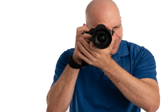 Fotograf hält Kamera in der Hand und fotografiert