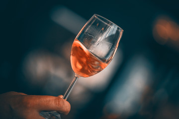 Rose Wine Glass and Bottle Close Up 