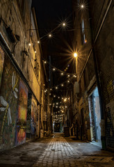 Fototapeta na wymiar Downtown Knoxville at night market square graffiti alley. 