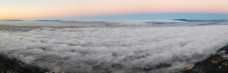 Aerial Panorama of Fog Drifting Over San Francisco Bay Area